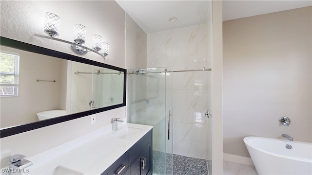 2505 4th St SW, Lehigh Acres, FL 33976 - full bathroom featuring a stall shower, a freestanding bath, and double vanity