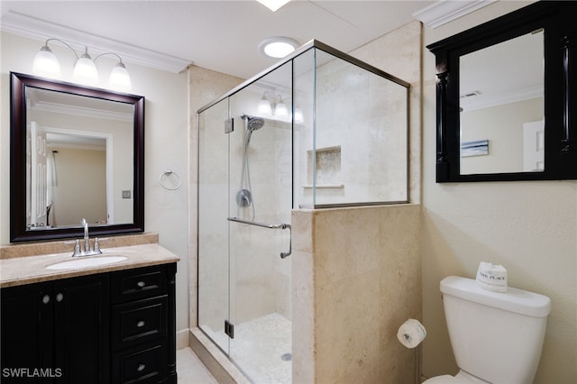 full bathroom featuring a stall shower, ornamental molding, vanity, and toilet