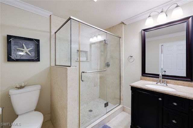 full bath with ornamental molding, a shower stall, vanity, and toilet