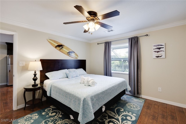bedroom with freestanding refrigerator, wood-type flooring, crown molding, baseboards, and ceiling fan