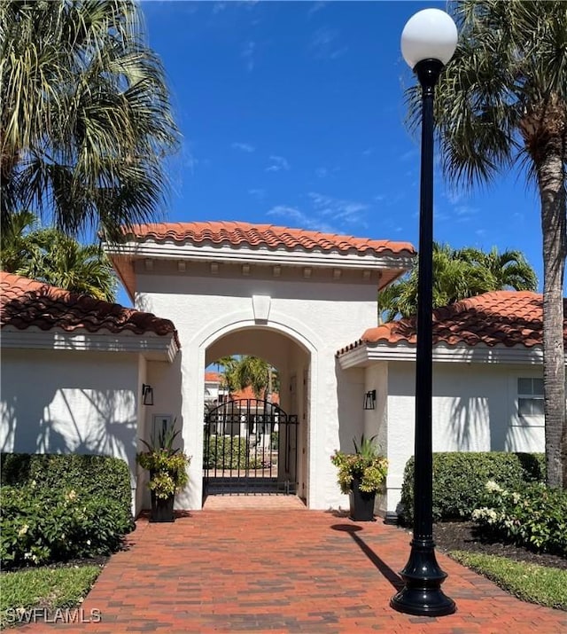 2452 Terra Verde Ln Unit 2452, Naples, FL 34105 - view of property's community with a gate