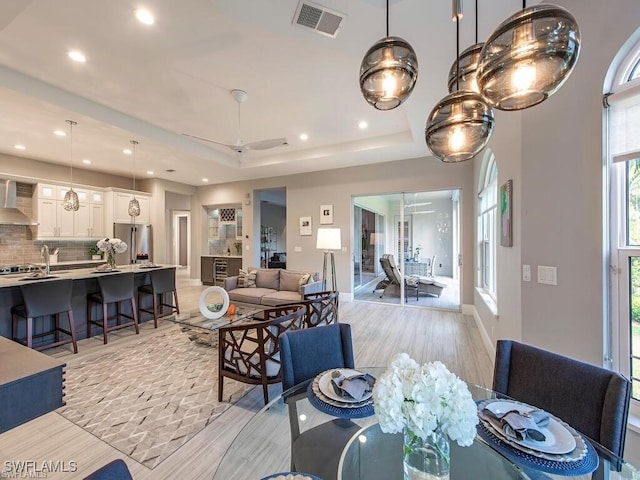 2452 Terra Verde Ln Unit 2452, Naples, FL 34105 - dining room featuring plenty of natural light, recessed lighting, a ceiling fan, and baseboards