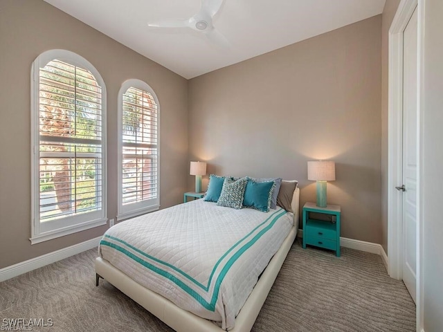 2452 Terra Verde Ln Unit 2452, Naples, FL 34105 - bedroom with carpet flooring, baseboards, and ceiling fan