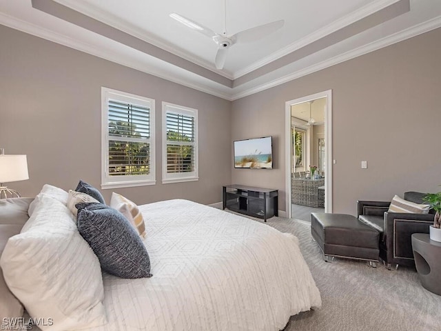 2452 Terra Verde Ln Unit 2452, Naples, FL 34105 - carpeted bedroom featuring ornamental molding, a raised ceiling, and ceiling fan