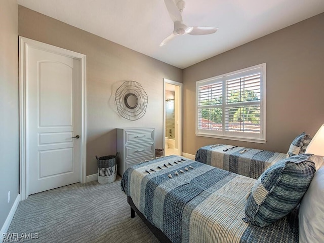 2452 Terra Verde Ln Unit 2452, Naples, FL 34105 - bedroom featuring carpet, baseboards, a ceiling fan, and connected bathroom