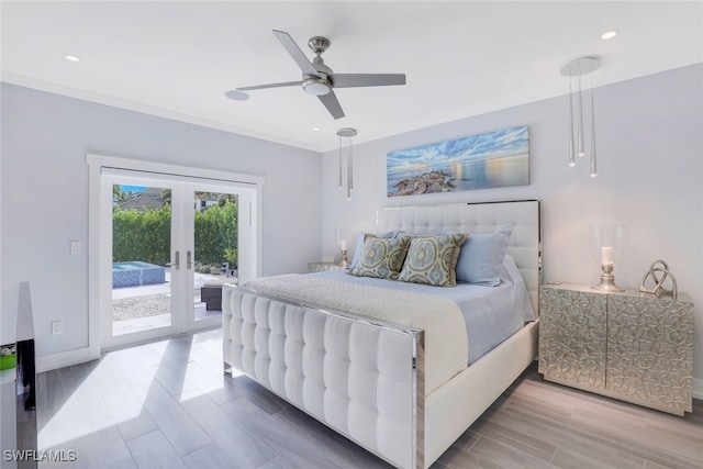 bedroom featuring access to outside, french doors, wood finish floors, recessed lighting, and baseboards