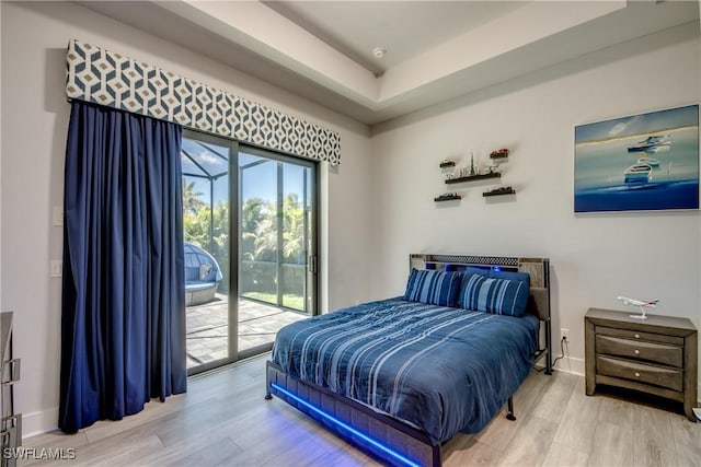 3726 Ceitus Pkwy, Cape Coral, FL 33991 - bedroom featuring access to outside, wood finished floors, and baseboards