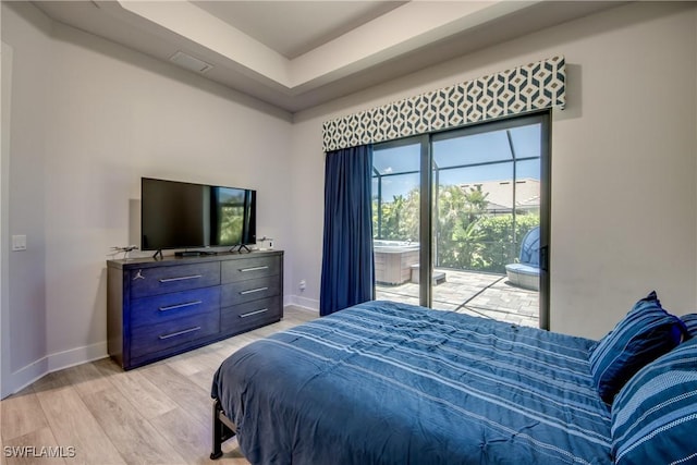 3726 Ceitus Pkwy, Cape Coral, FL 33991 - bedroom featuring access to exterior, light wood-style floors, and baseboards
