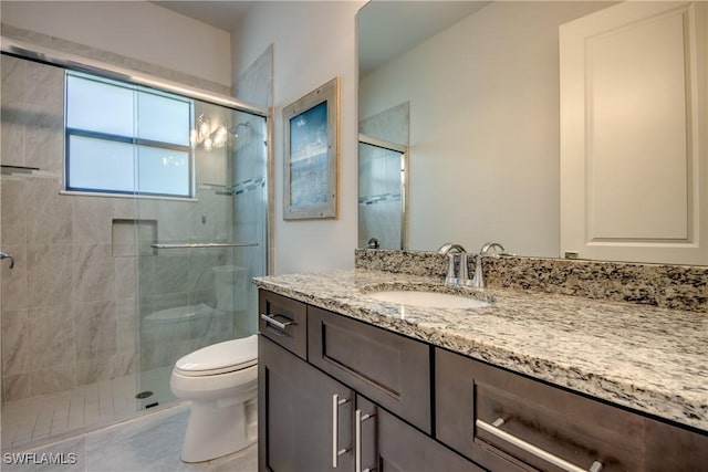 3726 Ceitus Pkwy, Cape Coral, FL 33991 - bathroom featuring vanity, toilet, and a shower stall