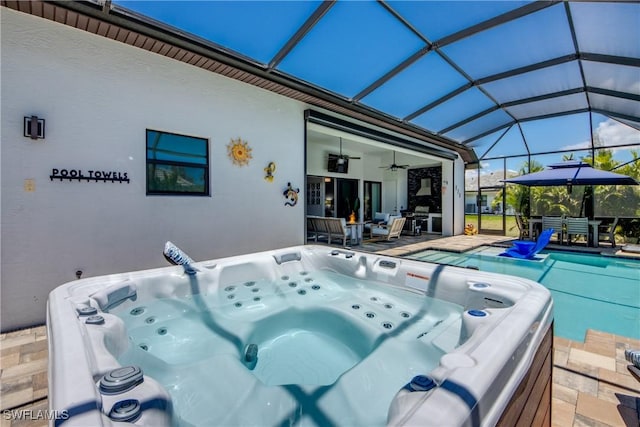 3726 Ceitus Pkwy, Cape Coral, FL 33991 - swimming pool featuring a ceiling fan, a hot tub, a patio, and glass enclosure