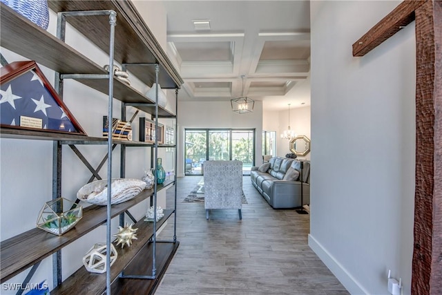 3726 Ceitus Pkwy, Cape Coral, FL 33991 - hall with baseboards, coffered ceiling, beamed ceiling, wood finished floors, and a chandelier