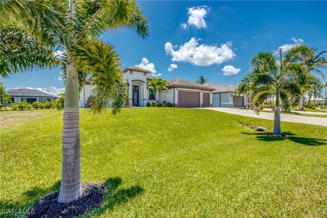 3726 Ceitus Pkwy, Cape Coral, FL 33991 - mediterranean / spanish house featuring driveway, a garage, and a front lawn