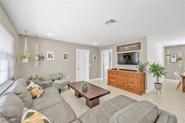 5397 25th Ave SW, Naples, FL 34116 - living room featuring light tile patterned flooring, plenty of natural light, baseboards, and recessed lighting