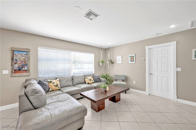 5397 25th Ave SW, Naples, FL 34116 - living area featuring light tile patterned floors, baseboards, and recessed lighting