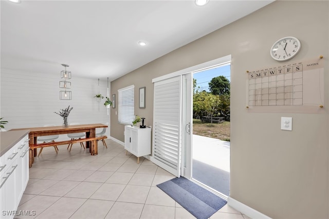 5397 25th Ave SW, Naples, FL 34116 - doorway featuring recessed lighting, light tile patterned floors, and baseboards