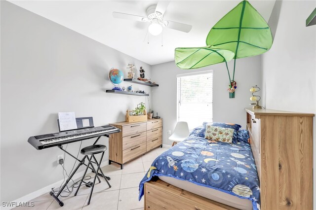 5397 25th Ave SW, Naples, FL 34116 - bedroom with light tile patterned floors, baseboards, and a ceiling fan