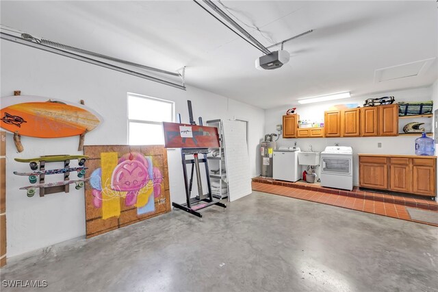 5397 25th Ave SW, Naples, FL 34116 - garage featuring electric water heater, a garage door opener, and a sink