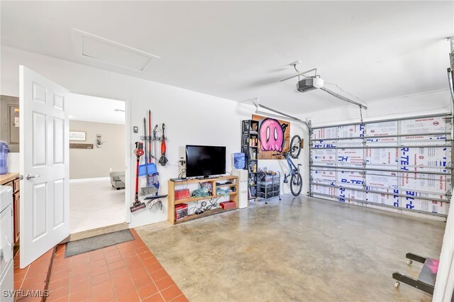 5397 25th Ave SW, Naples, FL 34116 - garage with a garage door opener