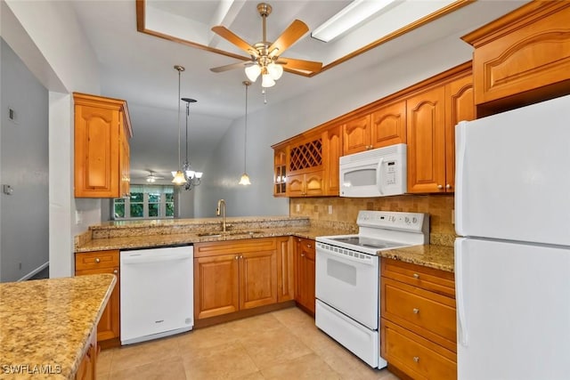 3450 Frosty Way Unit 5210, Naples, FL 34112 - kitchen featuring white appliances, a sink, ceiling fan, tasteful backsplash, and brown cabinetry