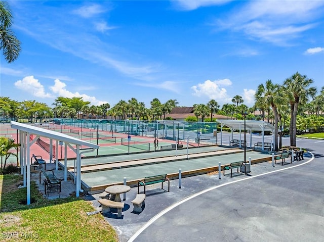 3450 Frosty Way Unit 5210, Naples, FL 34112 - view of property's community featuring a bocce ball area and fence