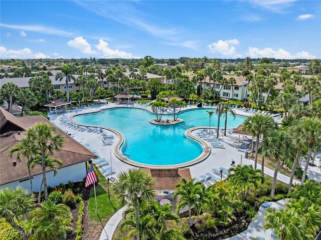 3450 Frosty Way Unit 5210, Naples, FL 34112 - community pool with a residential view
