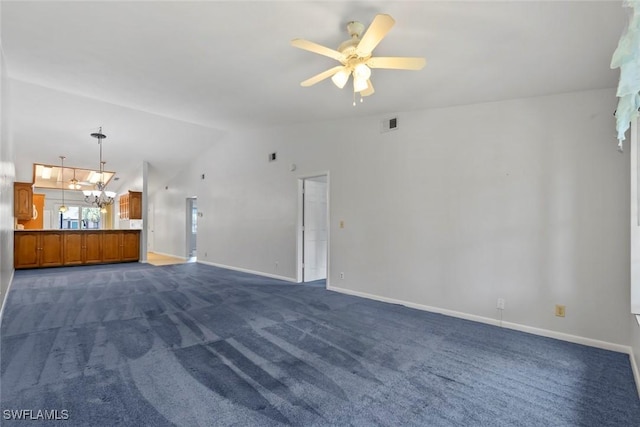 3450 Frosty Way Unit 5210, Naples, FL 34112 - unfurnished living room with a chandelier, lofted ceiling, dark colored carpet, ceiling fan, and baseboards