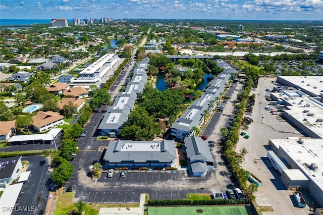 600 Neapolitan Way Unit 153, Naples, FL 34103 - aerial view of property and surrounding area featuring a nearby body of water