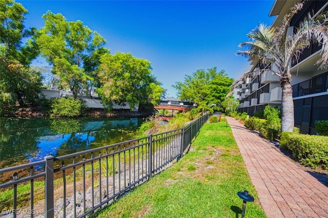 600 Neapolitan Way Unit 153, Naples, FL 34103 - view of yard with a water view