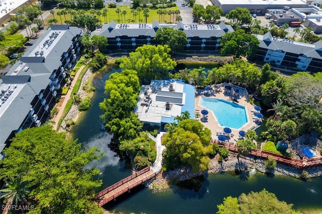 600 Neapolitan Way Unit 153, Naples, FL 34103 - aerial view of a pool area and a nearby body of water
