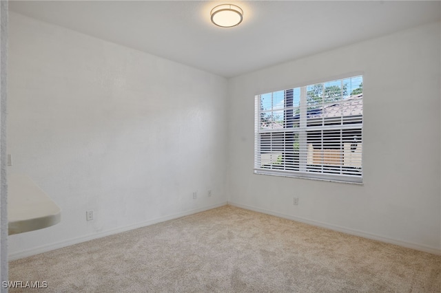 14541 Daffodil Dr Unit 1702, Fort Myers, FL 33919 - carpeted empty room with baseboards