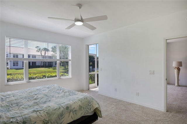 14541 Daffodil Dr Unit 1702, Fort Myers, FL 33919 - bedroom featuring carpet floors, baseboards, and ceiling fan