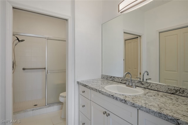 14541 Daffodil Dr Unit 1702, Fort Myers, FL 33919 - full bath featuring toilet, a shower stall, and vanity