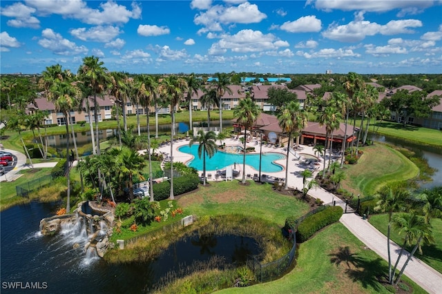 14541 Daffodil Dr Unit 1702, Fort Myers, FL 33919 - aerial view of property's location with a pool area, nearby suburban area, and a large body of water