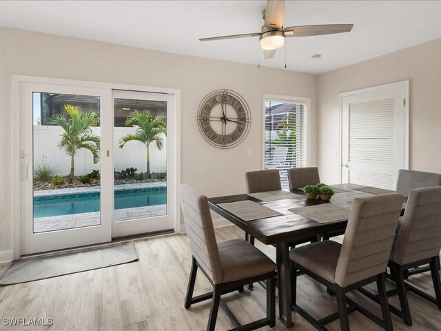 698 99th Ave N, Naples, FL 34108 - dining area featuring light wood-type flooring and ceiling fan
