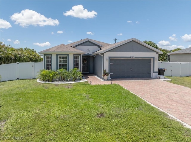 18 SW 19th Ter, Cape Coral, FL 33991 - single story home with a gate, decorative driveway, an attached garage, and stucco siding