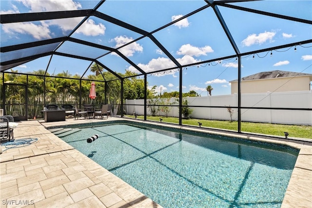 18 SW 19th Ter, Cape Coral, FL 33991 - view of pool with a patio area, fence, and glass enclosure