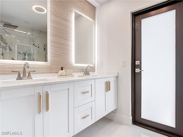 125 SE 41st Ter, Cape Coral, FL 33904 - full bathroom with a marble finish shower and double vanity