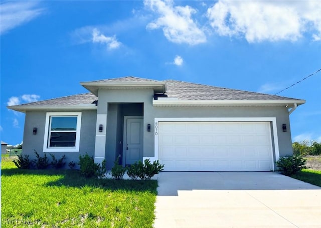 8070 Marsh Cir, Labelle, FL 33935 - view of front facade with concrete driveway, stucco siding, a garage, a front lawn, and roof with shingles