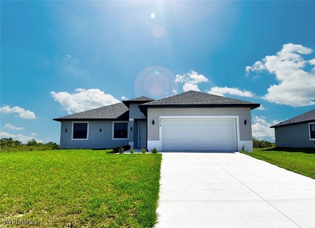 9018 W Castle Cir, Labelle, FL 33935 - single story home featuring a garage, stucco siding, concrete driveway, and a front yard