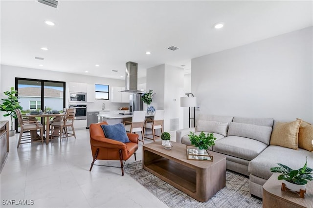 9018 W Castle Cir, Labelle, FL 33935 - living room featuring recessed lighting