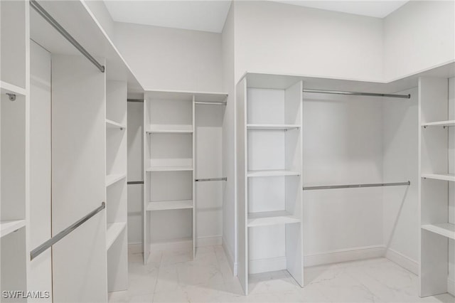 9018 W Castle Cir, Labelle, FL 33935 - walk in closet featuring marble finish flooring