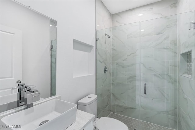 8106 Olive Ct, Labelle, FL 33935 - bathroom with a stall shower, toilet, and vanity