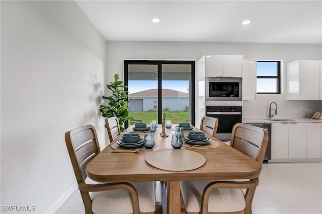 8106 Olive Ct, Labelle, FL 33935 - dining area featuring recessed lighting and baseboards