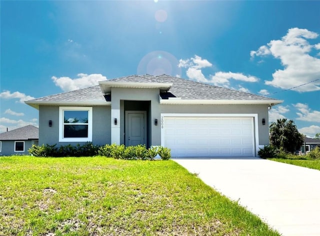 2008 Hercules Rd, Labelle, FL 33935 - view of front of property featuring an attached garage, a front yard, stucco siding, driveway, and roof with shingles