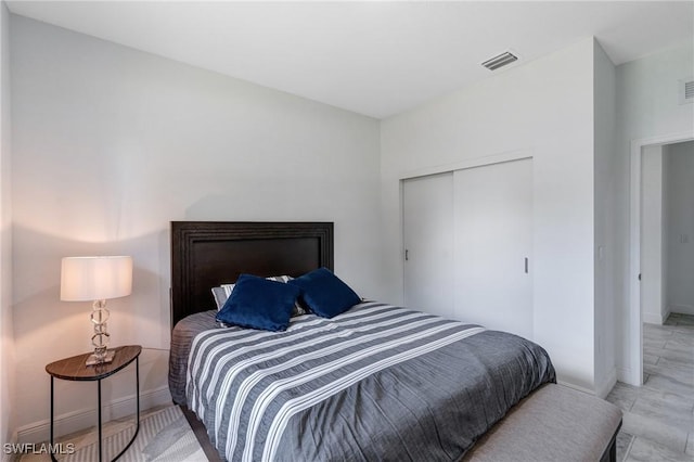 2008 Hercules Rd, Labelle, FL 33935 - bedroom featuring baseboards and a closet