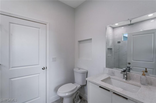 2008 Hercules Rd, Labelle, FL 33935 - full bath featuring toilet, a marble finish shower, vanity, baseboards, and recessed lighting
