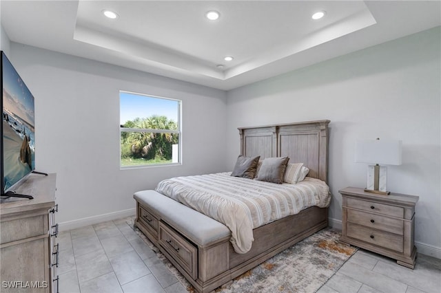 2008 Hercules Rd, Labelle, FL 33935 - bedroom with a tray ceiling, recessed lighting, baseboards, and light tile patterned floors