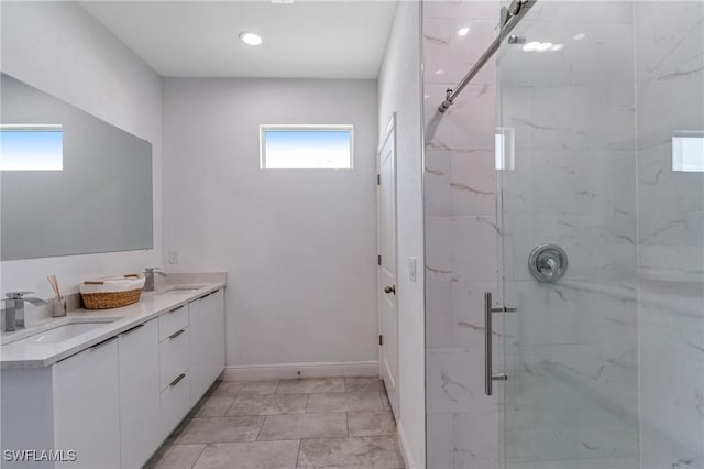 2008 Hercules Rd, Labelle, FL 33935 - bathroom with a marble finish shower, baseboards, double vanity, and recessed lighting