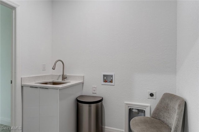 2008 Hercules Rd, Labelle, FL 33935 - washroom with electric dryer hookup, washer hookup, and bar with sink