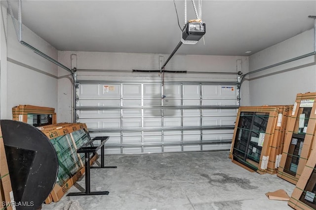 2008 Hercules Rd, Labelle, FL 33935 - garage featuring a garage door opener